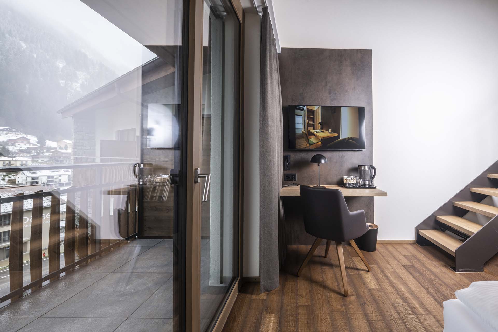 Maisonettezimmer mit Balkon